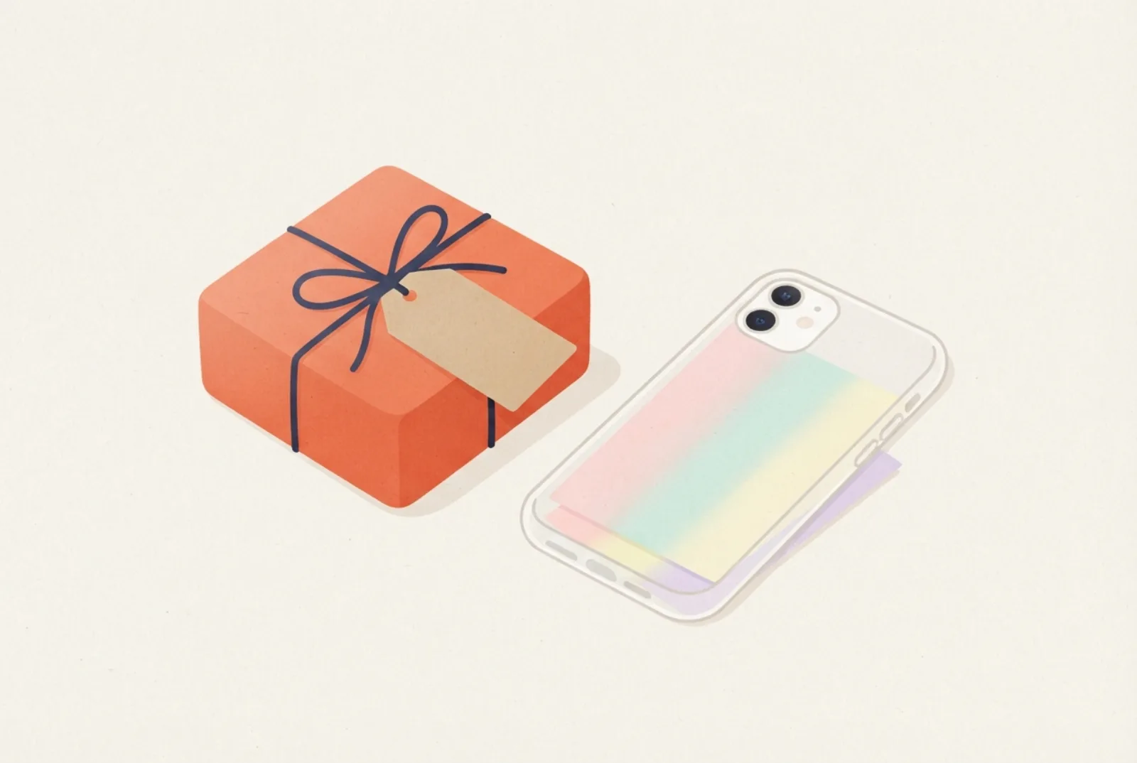 A small gift box with a ribbon and blank kraft tag next to a clear phone case with a pastel insert peeking out